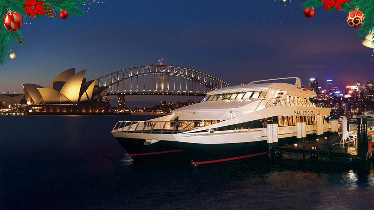 Christmas Party cruise at night with the Opera House and Harbour Bridge behind